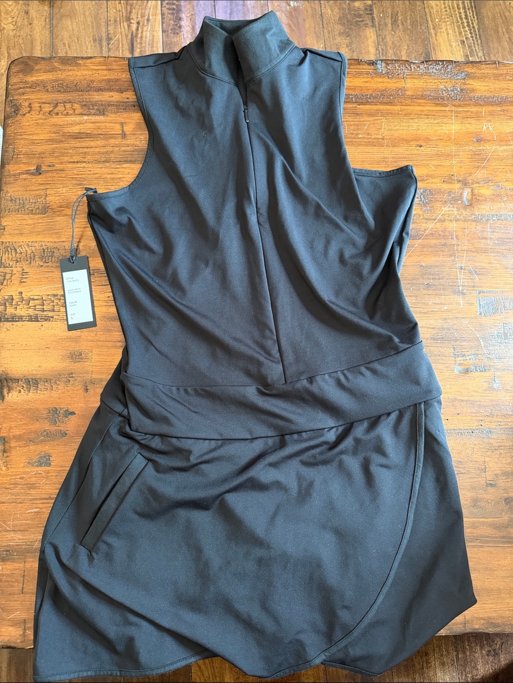Sleeveless Black Mock-Neck Mini Dress